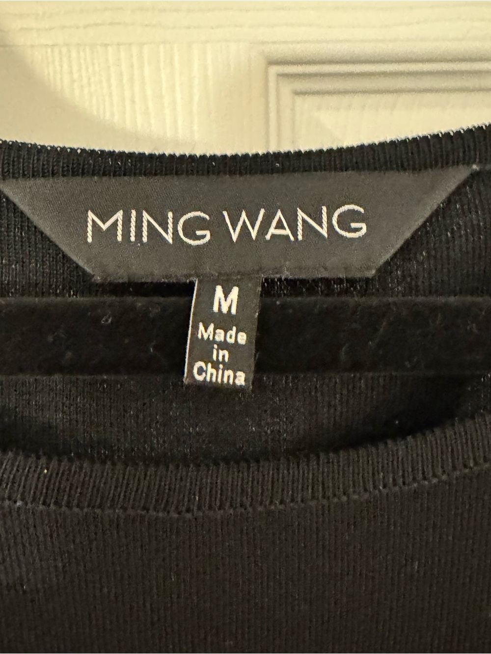 Ming Wang Black Ponte Knit Sleeveless Ruffle-Hem Dress